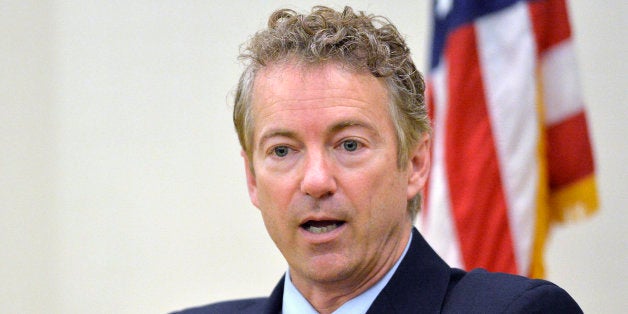 FILE - In this Nov. 21, 214 file photo, Sen. Rand Paul, R-Ky. speaks in Highland Heights, Ky. The presidential contest that's starting to take shape is exposing divisions among likely Republican candidates on the nation's role in global affairs. Among those outlining foreign policy this week: Bush, Rand Paul, Ted Cruz and Bobby Jindal, as well as the party's 2008 presidential nominee, Sen. John McCain. (AP Photo/Timothy D. Easley, File)