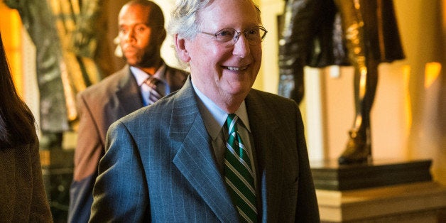 WASHINGTON, DC - OCTOBER 14: Senate Minority Leader Mitch McConnell (R-KY) walks back to his office after voting in the Senate Chamber on October 14, 2013 in Washington, DC. As Democratic and Republican leaders negotiate an end to the shutdown and a way to raise the debt limit, the White House postponed a planned Monday afternoon meeting with Boehner and other Congressional leaders. The government shutdown is currently in its 14th day. (Photo by Andrew Burton/Getty Images)