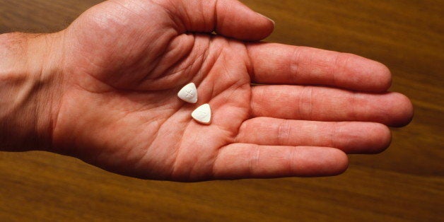 Ecstasy pills in hand (Photo by Universal Images Group via Getty Images)