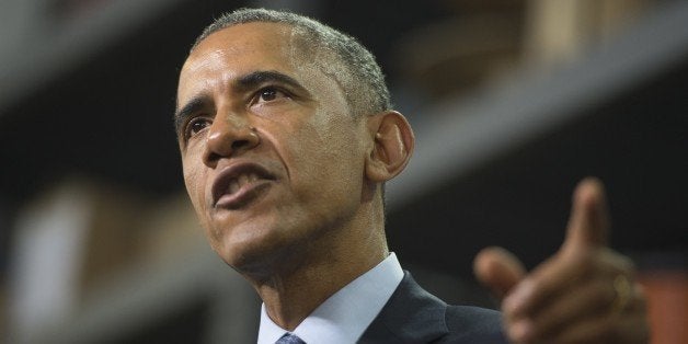 US President Barack Obama speaks about increasing access to high speed and affordable internet at Cedar Falls Utilities in Cedar Falls, Iowa, January 14, 2015. The town of Cedar Falls has built their own private high-speed internet network and runs it like a public utility. AFP PHOTO / SAUL LOEB (Photo credit should read SAUL LOEB/AFP/Getty Images)