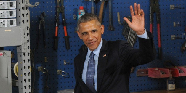 CEDAR FALLS, IA - JANUARY 14: U.S. President Barack Obama, greets employees and guests at the Cedar Falls Utilities office January 14, 2015 in Cedar Falls, Iowa. Obama laid out new steps to increase access to affordable, high-speed broadband across the country. (Photo by Steve Pope/Getty Images)