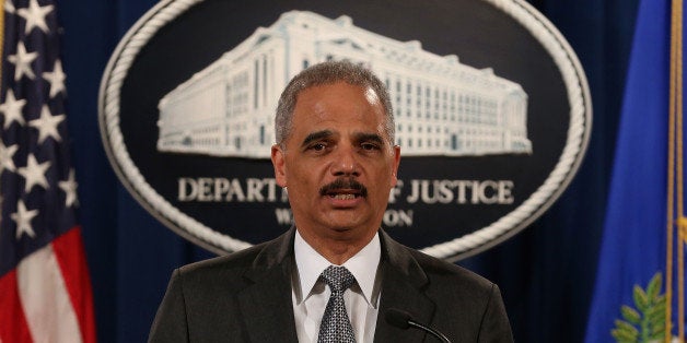 WASHINGTON, DC - DECEMBER 03: U.S. Attorney General Eric Holder speaks at the Justice Department December 3, 2014 in Washington, DC. Holder spoke about the recent decision by a Staten Island grand jury not to indict a police officer in the chokehold death of Eric Garner. (Photo by Mark Wilson/Getty Images)