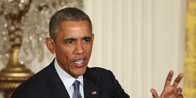 WASHINGTON, DC - JANUARY 16: U.S. President Barack Obama speaks during a news conference with British Prime Minister David Cameron in the East Room of the White House January 16, 2015 in Washington, DC. The two leaders had an Oval Office meeting earlier discussing bilateral issues including economic growth, international trade, cyber security, Iran, ISIL, counterterrorism, Ebola, and Russias actions in Ukraine. (Photo by Mark Wilson/Getty Images)