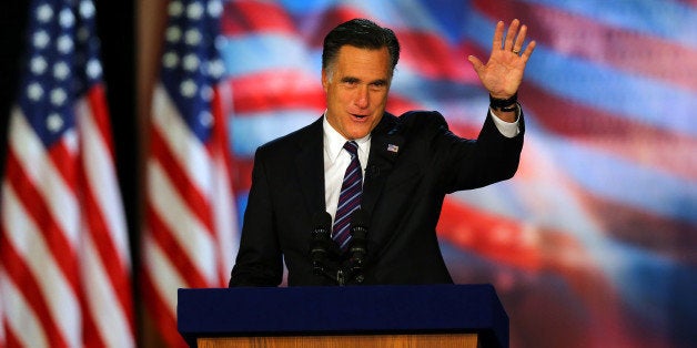 BOSTON, MA - NOVEMBER 07: Republican presidential candidate, Mitt Romney, waves to the crowd while speaking at the podium as he concedes the presidency during Mitt Romney's campaign election night event at the Boston Convention & Exhibition Center on November 7, 2012 in Boston, Massachusetts. After voters went to the polls in the heavily contested presidential race, networks projected incumbent U.S. President Barack Obama has won re-election against Republican candidate, former Massachusetts Gov. Mitt Romney. (Photo by Joe Raedle/Getty Images)