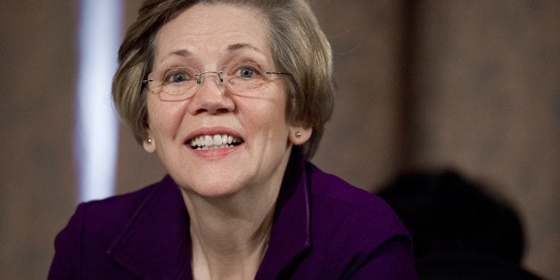 US Democratic Senator Elizabeth Warren of Massachusetts attends a Senate Banking, Housing and Urban Affairs Committee hearing on Capitol Hill, on February 27, 2014. AFP PHOTO / Saul LOEB (Photo credit should read SAUL LOEB/AFP/Getty Images)