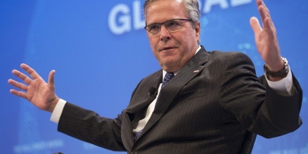 Former Florida Governor Jeb Bush speaks during the Wall Street Journal CEO Council in Washington, DC, December 1, 2014. AFP PHOTO / Jim WATSON (Photo credit should read JIM WATSON/AFP/Getty Images)