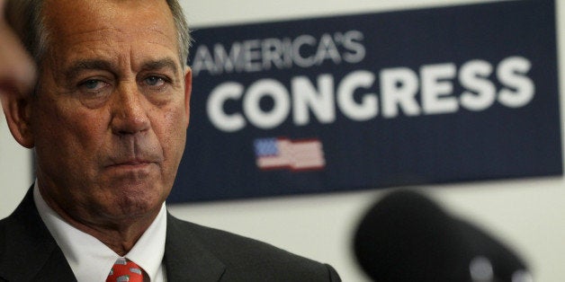 WASHINGTON, DC - JANUARY 21: U.S. Speaker of the House Rep. John Boehner (R-OH) listens during a briefing to members of the media after a House Republican Caucus meeting January 21, 2015 on Capitol Hill in Washington, DC. The House GOP leadership briefed the media on their responses to President Obama's State of the Union address the night before. (Photo by Alex Wong/Getty Images)