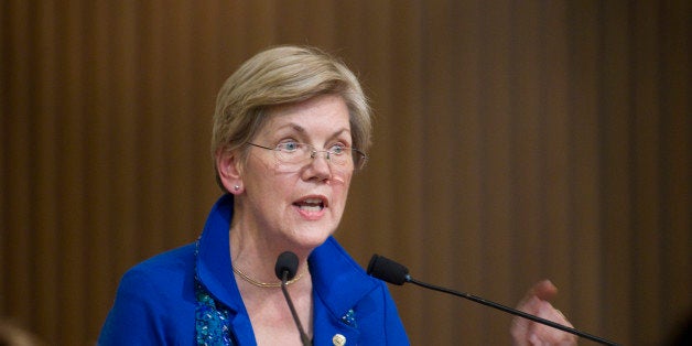 BOSTON - JANUARY 11: U.S. Senator from Massachusetts Elizabeth Warren received the MLK Leadership Award during the Martin Luther King, Jr. Convocation service at Twelfth Baptist Church in the Roxbury neighborhood on January 11, 2015. (Photo by Dina Rudick/The Boston Globe via Getty Images)