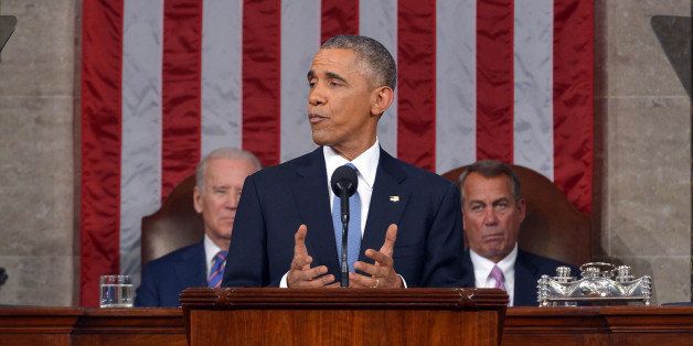 President Barack Obama delivers his State of the Union address to a joint session of Congress on Capitol Hill on Tuesday, Jan. 20, 2015, in Washington. Vice President Joe Biden and House Speaker John Boehner of Ohio, listen in the background. (AP Photo/Mandel Ngan, Pool)