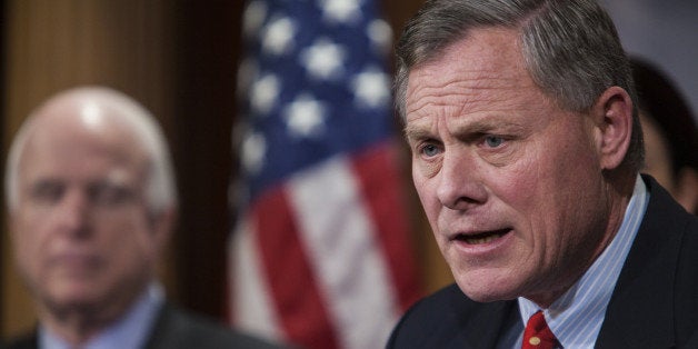 WASHINGTON, D.C. - JANUARY 13: Senator Richard Burr (R) speaks at a press conference with Senator Lindsey Graham (not seen), Senator John McCain (L), and Senator Kelly Ayotte (2nd L) to announce new proposed legislation to limit President Obamas ability to release prisoners from Guantanamo in Washington, D.C. on January 13, 2015. (Photo by Samuel Corum/Anadolu Agency/Getty Images)