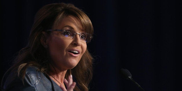 WASHINGTON, DC - SEPTEMBER 26: Former Alaska Gov. Sarah Palin (R) speaks at the 2014 Values Voter Summit September 26, 2014