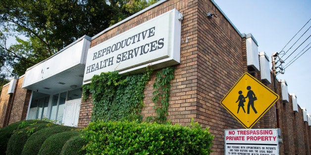 In this Wednesday, July 30, 2014 photo, Reproductive Health Services is shown, in Montgomery, Ala. Reproductive Health Services is the only abortion clinic in Montgomery and an Alabama law restricting doctors at abortion clinics was ruled unconstitutional because it would unduly hamper women's ability to obtain the medical procedure, a judge said Monday, Aug. 4, 2014. (AP Photo/Brynn Anderson)