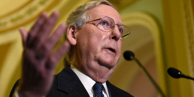 Senate Majority Leader Mitch McConnell of Ky. speaks to reporters on Capitol Hill in Washington, Tuesday, Jan. 13, 2015, following a Republican policy luncheon. (AP Photo/Susan Walsh)