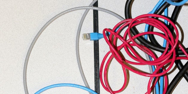 NEW YORK, NY - NOVEMBER 10: Network cables are plugged in a server room on November 10, 2014 in New York City. U.S. President Barack Obama called on the Federal Communications Commission to implement a strict policy of net neutrality and to oppose content providers in restricting bandwith to customers. (Photo by Michael Bocchieri/Getty Images)