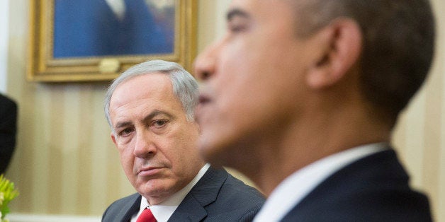 WASHINGTON, DC - MARCH 3: (AFP OUT) Israel Prime Minister Benjamin Netanyahu (L) sits with U.S. President Barack Obama during a meeting in the Oval Office of the White House March 3, 2014 in Washington, D.C. Obama urged Netanyahu to 'seize the moment' to make peace, saying time is running out of time to negotiate an Israeli-Palestinian agreement. (Photo by Andrew Harrer-Pool/Getty Images)