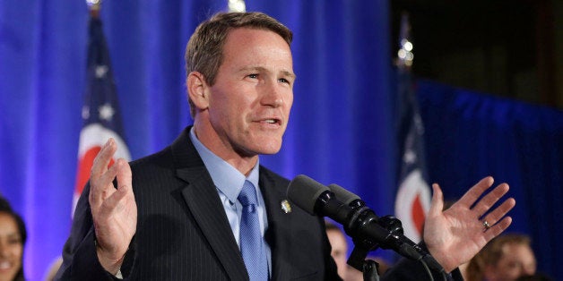 Ohio Secretary of State Jon Husted speaks to supporters at the Ohio Republican Party celebration Tuesday, Nov. 4, 2014, in Columbus, Ohio. Husted beat state Sen. Nina Turner of Cleveland. (AP Photo/Tony Dejak)