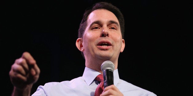 DES MOINES, IA - JANUARY 24: Wisconsin Gov. Scott Walker speaks to guests at the Iowa Freedom Summit on January 24, 2015 in Des Moines, Iowa. The summit is hosting a group of potential 2016 Republican presidential candidates to discuss core conservative principles ahead of the January 2016 Iowa Caucuses. (Photo by Scott Olson/Getty Images)