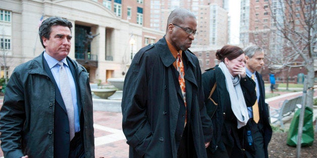 Former CIA officer Jeffrey Sterling, second from left, leaves the Alexandria Federal Courthouse Monday, Jan. 26, 2015, in Alexandria, Va., with his wife, Holly, second from right, attorney Barry Pollack, right, and attorney Edward MacMahon, after he was convicted on all nine counts he faced of leaking classified details of an operation to thwart Iran's nuclear ambitions to a New York Times reporter. (AP Photo/Kevin Wolf)