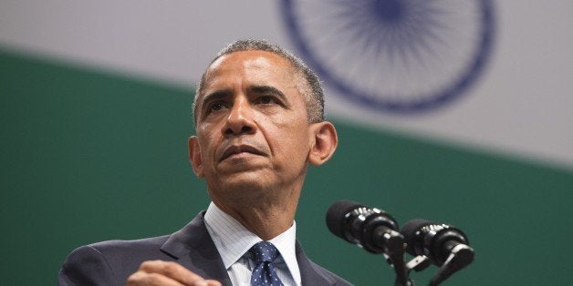 US President Barack Obama speaks on US - India relations during a townhall event at Siri Fort Auditorium in New Delhi on January 27, 2015. President Barack Obama said the United States could be India's 'best partner' January 27 as he wrapped up a three-day visit to New Delhi by highlighting the shared values of the world's biggest democracies. AFP PHOTO / SAUL LOEB (Photo credit should read SAUL LOEB/AFP/Getty Images)