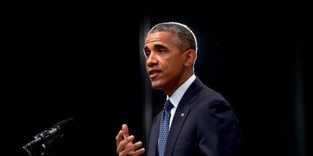 U.S. President Barack Obama speaks at the Siri Fort Auditorium in New Delhi, India, Tuesday, Jan. 27, 2015. Obama's speech closed a three-day visit to celebrate India's Republic Day, the anniversary of India's democratic constitution taking force in 1950. (AP Photo/Carolyn Kaster)