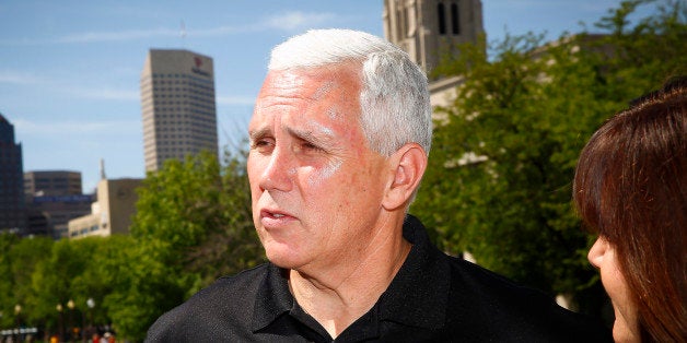 INDIANAPOLIS, IN - MAY 24: Indiana governor Mike Pence attends the 2014 IPL 500 Festival Parade during the 2014 Indy 500 Fest