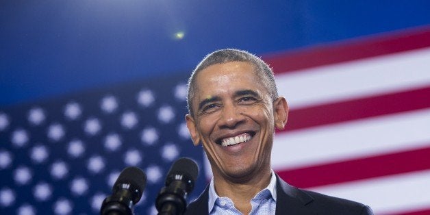 US President Barack Obama speaks at a campaign rally for Democratic Governor Dan Malloy, who is up for re-election, at Central High School in Bridgeport, Connecticut, November 2, 2014. AFP PHOTO / Saul LOEB (Photo credit should read SAUL LOEB/AFP/Getty Images)