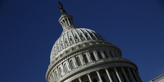 WASHINGTON, DC - SEPTEMBER 29: The United States Capitol building is seen as Congress remains gridlocked over legislation to continue funding the federal government September 29, 2013 in Washington, DC. The House of Representatives passed a continuing resolution with language to defund U.S. President Barack Obama's national health care plan yesterday, but Senate Majority Leader Harry Reid has indicated the U.S. Senate will not consider the legislation as passed by the House. (Photo by Win McNamee/Getty Images)