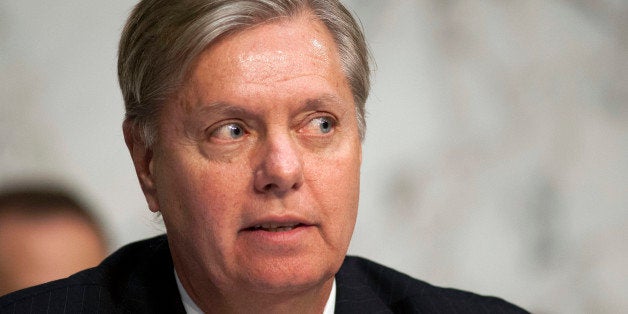 Sen. Lindsey Graham, R-S.C., questions a witness on Capitol Hill in Washington, Tuesday, April 23, 2013, on Capitol Hill in Washington, during a Senate Judiciary subcommittee on the Constitution, Civil Rights, and Human Rights hearing on drone use. Senate Democrats and Republicans challenged the Obama administration to explicitly spell out its justification for using drones for targeted killings amid growing concerns about unchecked powers of the presidency and Americans' civil liberties. (AP Photo/Cliff Owen)