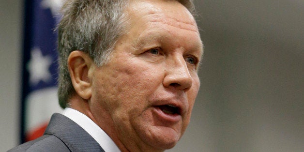FILE - In this Oct. 18, 2013 file photo, Ohio Gov. John Kasich speaks in Cleveland. Partisan politics are coloring governorsâ