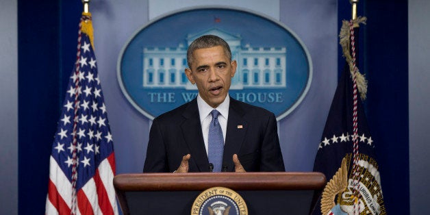 President Barack Obama speaks during a news conference in the Brady Press Briefing Room of the Whire House in Washington, Friday, Dec. 19, 2014. The president said US is making significant strides where it counts, beginning with the economy. (AP Photo/Carolyn Kaster)