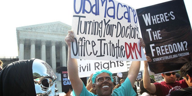 WASHINGTON, DC - JUNE 28: Anti-Obamacare protesters wear masks of U.S. President Barack Obama and Grim Reaper as they demonstrate in front of the U.S. Supreme Court June 28, 2012 in Washington, DC. The Supreme Court is expected to hand down its ruling on the Affordable Healthcare Act this morning. (Photo by Alex Wong/Getty Images)