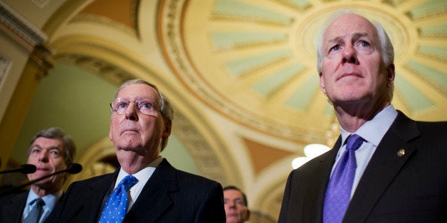 UNITED STATES - NOVEMBER 13: Incoming Senate Majority Leader Mitch McConnell, R-Ky., second from left, and incoming Majority Whip John Cornyn, R-Texas, right, conduct a news conference after the senate luncheons, November 13, 2014. Sen. Roy Blunt, R-Mo., left, and John Barrasso, R-Wyo., also appear. (Photo By Tom Williams/CQ Roll Call)