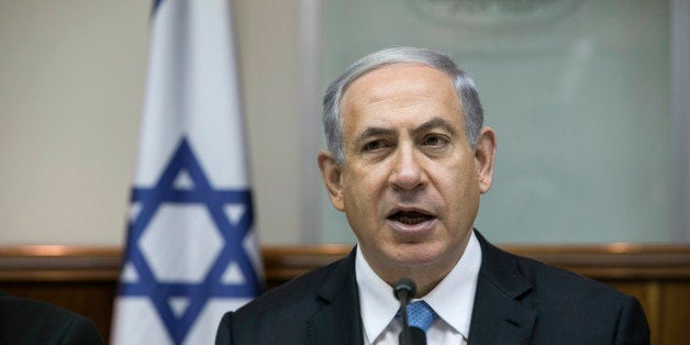 Israeli Prime Minister Benjamin Netanyahu attends the weekly cabinet meeting in his Jerusalem office, Sunday, Jan. 25, 2015.