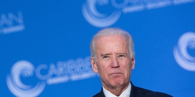 US Vice President Joe Biden addresses the first Caribbean Energy Security Summit in Washington, DC on January 26, 2015. AFP PHOTO/NICHOLAS KAMM (Photo credit should read NICHOLAS KAMM/AFP/Getty Images)