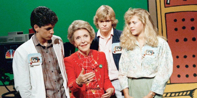 First Lady Nancy Reagan urges youngsters in Burbank to "say no to drugs," as three young Los Angeles actors watch, Sept. 26, 1985. Jesse Howard, left, Nick Katt and Kristi Blackburn (far right) participated in one of the messages which will air next month. (AP Photo/Vally Fong)