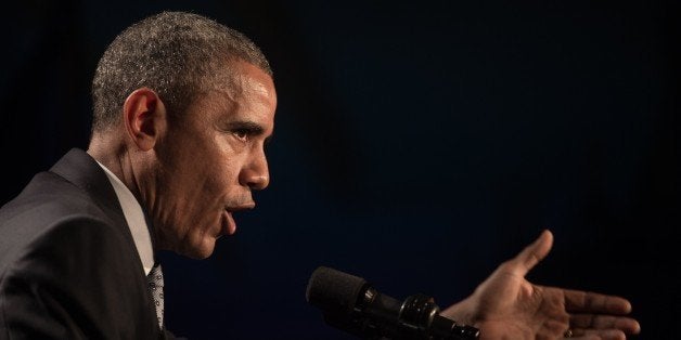 US President Barack Obama addresses the House Democratic Caucus retreat on January 29, 2015 in Philadelphia. AFP PHOTO/NIC