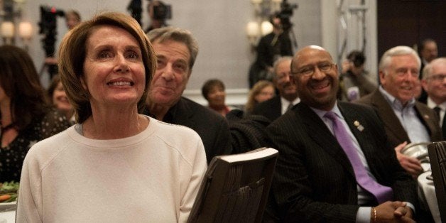 US House Minority Leader Nancy Pelosi (L), her husband Paul Pelosi (2nd L), Philadelphia Mayor Michael Nutter (2nd R) and House Minority Whip Steny Hoyer (R) listen to US President Barack Obama address the House Democratic Caucus retreat on January 29, 2015 in Philadelphia. AFP PHOTO/NICHOLAS KAMM (Photo credit should read NICHOLAS KAMM/AFP/Getty Images)