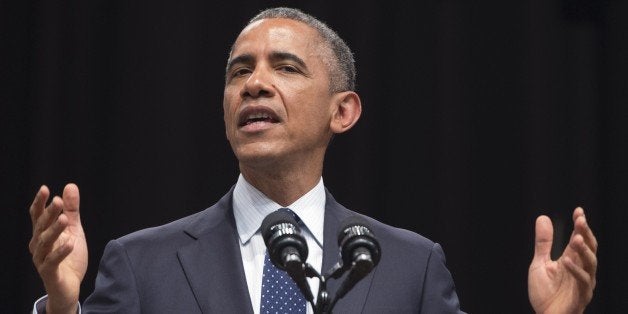 US President Barack Obama speaks on US - India relations during a townhall event at Siri Fort Auditorium in New Delhi on January 27, 2015. President Barack Obama said the United States could be India's 'best partner' January 27 as he wrapped up a three-day visit to New Delhi by highlighting the shared values of the world's biggest democracies. AFP PHOTO / SAUL LOEB (Photo credit should read SAUL LOEB/AFP/Getty Images)