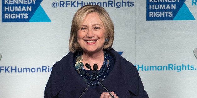 NEW YORK, NY - DECEMBER 16: Event honoree Hillary Rodham Clinton speaks on stage during the 2014 Robert F. Kennedy Ripple Of Hope Awards at the New York Hilton on December 16, 2014 in New York City. (Photo by Mike Pont/FilmMagic)