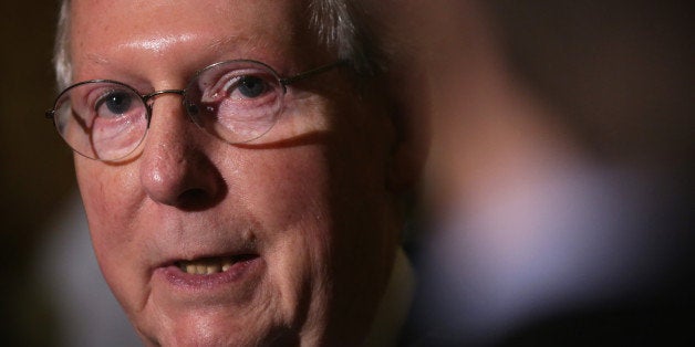 WASHINGTON, DC - DECEMBER 16: U.S. Senate Minority Leader Sen. Mitch McConnell (R-KY) speaks to members of the media after the weekly Senate Republican Policy Luncheon December 16, 2014 on Capitol Hill in Washington, DC. Senate Republicans held the weekly luncheon to discuss Republican agenda. (Photo by Alex Wong/Getty Images)