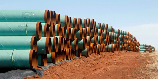 FILE - In this Feb. 1, 2012 file photo, miles of pipe ready to become part of the Keystone Pipeline are stacked in a field near Cushing, Okla. Oklahoma leaders are praising the renewed momentum in Congress to approve the northern leg of the Keystone XL pipeline, although the project will have only a minimal economic impact on the Sooner State.(AP Photo/Sue Ogrocki, File)