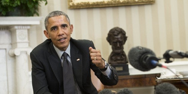 US President Barack Obama speaks about immigration reform during a meeting with young immigrants, known as DREAMers, in the Oval Office of the White House in Washington, DC, February 4, 2015. The group has received Deferred Action for Childhood Arrivals (DACA), which provides relief from deportation for immigrants who arrived in the US illegally before they were 16 years old. AFP PHOTO / SAUL LOEB (Photo credit should read SAUL LOEB/AFP/Getty Images)