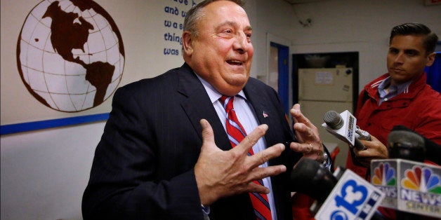 Maine Gov. Paul LePage speaks to the media at a homeless shelter Monday, July 28, 2014, in Lewiston, Maine. LePage, the governor of the state with the largest percentage of white people, placed thousands of miles from the southern border, has thrust the issue of immigration to the forefront with his criticism over the federal government's placement of eight immigrants in the state. (AP Photo/Robert F. Bukaty)