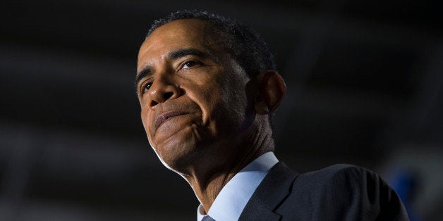 President Barack Obama pauses as he delivers remarks at the Department of Homeland Security on his FY2016 budget proposal, on Monday, Feb. 2, 2015, in Washington. Obama warned congressional Republicans Monday that he won't accept a spending plan that boosts national security at the expense of domestic programs for the middle class. (AP Photo/Evan Vucci)