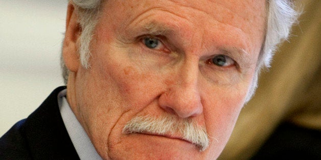 John Kitzhaber, governor of Oregon, waits from the start of a roundtable meeting titled 'Insourcing American Jobs' in the Eisenhower Executive Office Building in Washington, D.C., U.S., on Wednesday, Jan. 11, 2012. Obama said he'll propose new tax incentives to reward companies that invest in U.S. expansion or bring back jobs from overseas and urge elimination of tax breaks to companies that move jobs outside the country. Photographer: Joshua Roberts/Bloomberg via Getty Images 