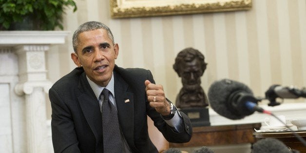 US President Barack Obama speaks about immigration reform during a meeting with young immigrants, known as DREAMers, in the Oval Office of the White House in Washington, DC, February 4, 2015. The group has received Deferred Action for Childhood Arrivals (DACA), which provides relief from deportation for immigrants who arrived in the US illegally before they were 16 years old. AFP PHOTO / SAUL LOEB (Photo credit should read SAUL LOEB/AFP/Getty Images)