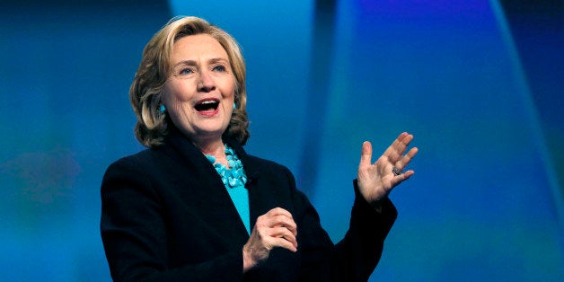 FILE - This Dec. 4, 2014, file photo shows former Secretary of State Hillary Rodham Clinton speaking at the Massachusetts Con