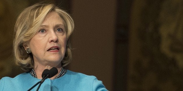 Former US Secretary of State Hillary Clinton discusses 'Smart Power: Security Through Inclusive Leadership' at Georgetown University in Washington, DC, December 3, 2014. AFP PHOTO / Jim WATSON (Photo credit should read JIM WATSON/AFP/Getty Images)