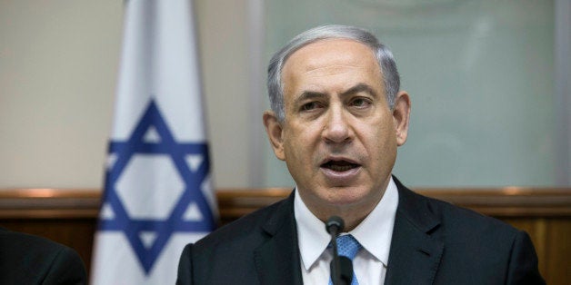 Israeli Prime Minister Benjamin Netanyahu attends the weekly cabinet meeting in his Jerusalem office, Sunday, Jan. 25, 2015.