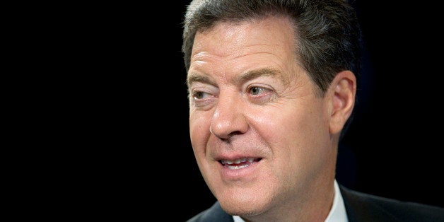 Sam Brownback, governor of Kansas, speaks during a Bloomberg Television interview inside the Bloomberg Link during the Republican National Convention in Tampa, Florida, U.S., on Tuesday Aug. 28, 2012. Mitt Romney secured enough delegates to officially win the Republican presidential nomination at the party's convention in Tampa. Photographer: David Paul Morris/Bloomberg via Getty Images